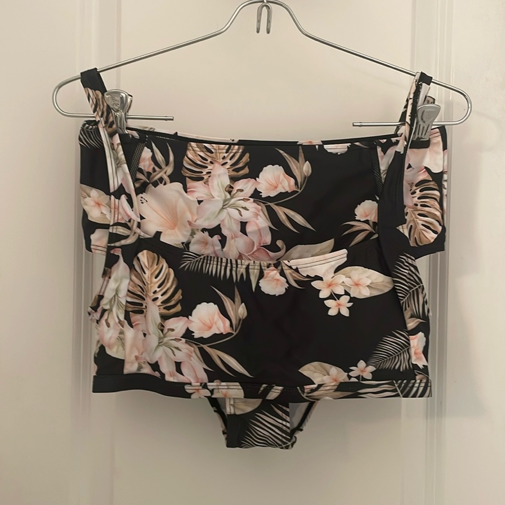 New in bag Medium black floral print two piece swimsuit.